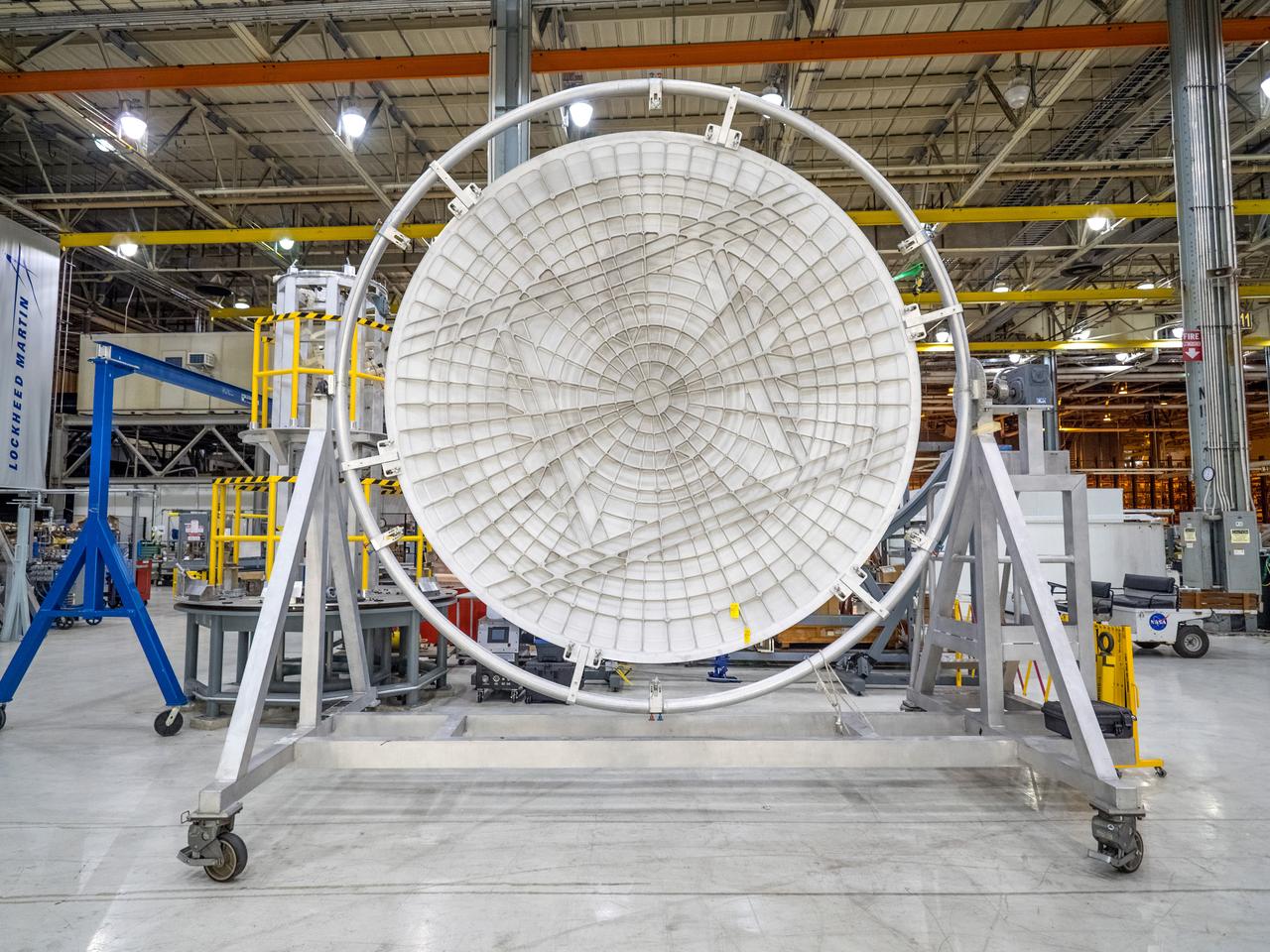 Pieces for the Orion spacecraft that will fly on Artemis I are prepared for welding at NASA's Michoud Assembly Facility in New Orleans, Louisiana on Aug. 6, 2015. Part of Batch image transfer from Flickr.