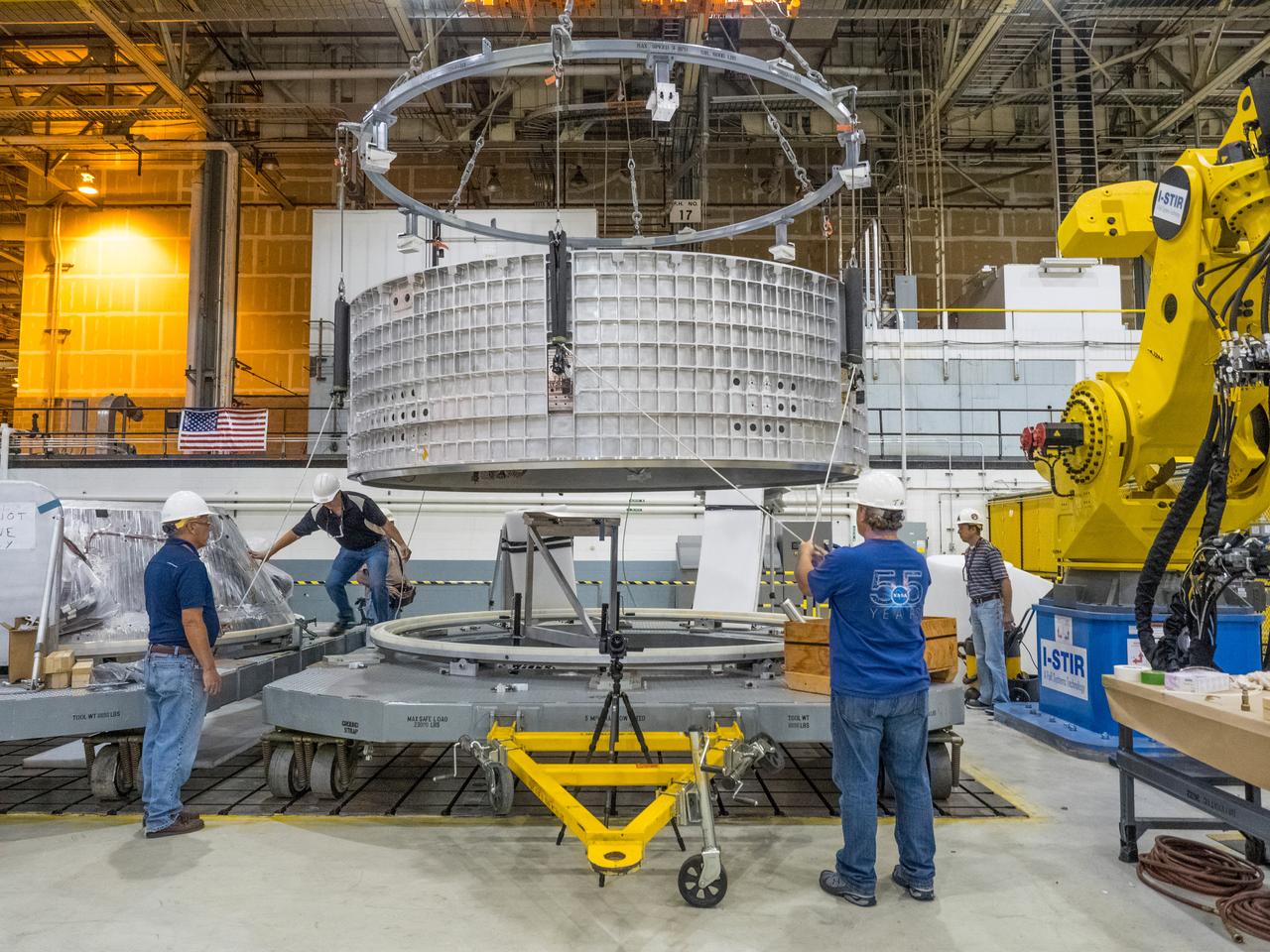 Pieces for the Orion spacecraft that will fly on Artemis I are prepared for welding at NASA's Michoud Assembly Facility in New Orleans, Louisiana on Aug. 7, 2015. Part of Batch image transfer from Flickr.