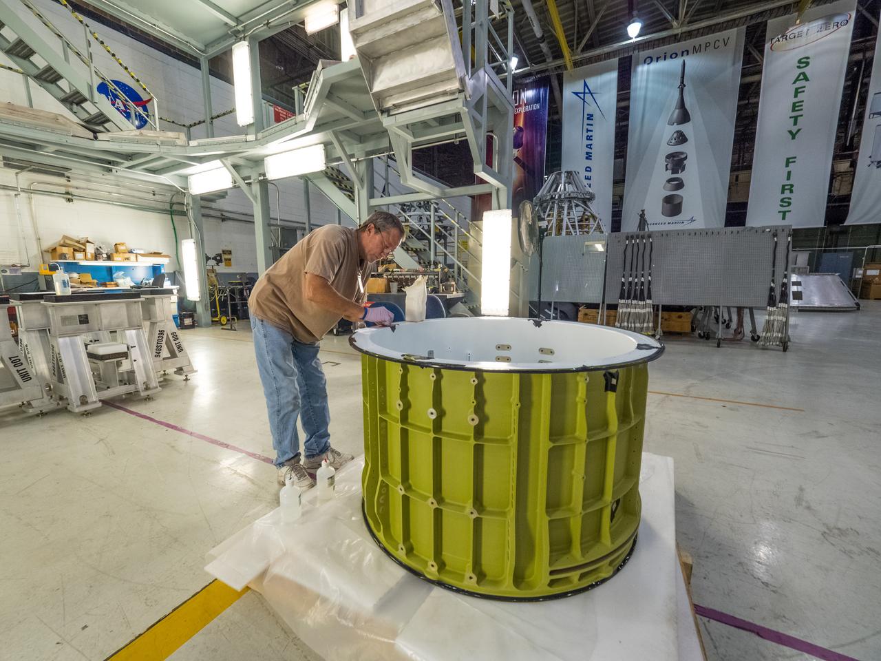 Pieces for the Orion spacecraft that will fly on Artemis I are prepared for welding at NASA's Michoud Assembly Facility in New Orleans, Louisiana on Aug. 7, 2015. Part of Batch image transfer from Flickr.