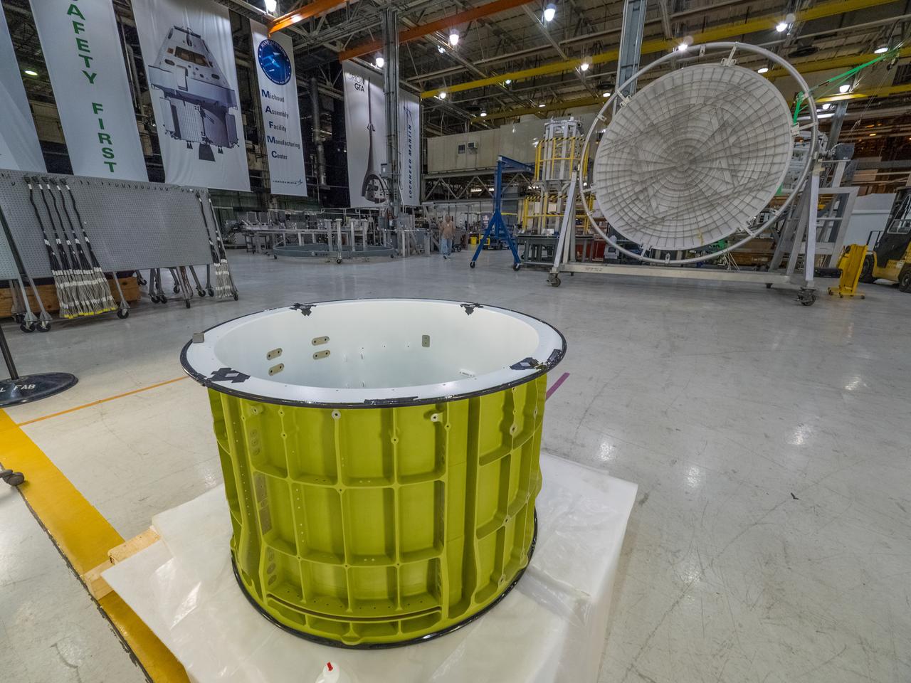 Pieces for the Orion spacecraft that will fly on Artemis I are prepared for welding at NASA's Michoud Assembly Facility in New Orleans, Louisiana on Aug. 7, 2015. Part of Batch image transfer from Flickr.