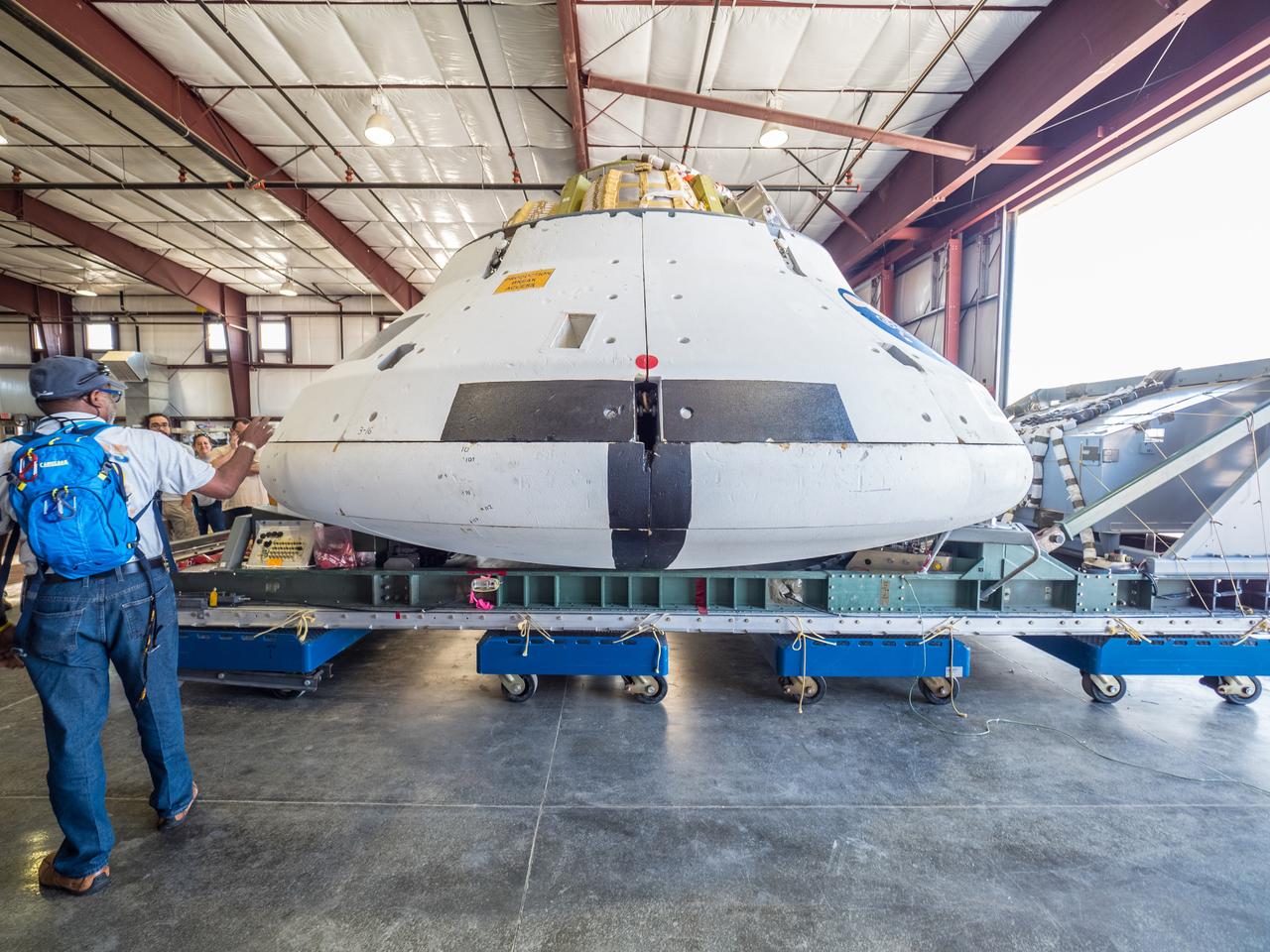 NASA engineers prepare for the test of the Orion spacecraft’s parachutes on Wednesday, Aug. 26 at the U.S. Army’s Yuma Proving Ground in Arizona on Aug. 24, 2015. An engineering model of the spacecraft will drop from an airplane 35,000 feet up to evaluate how it fares when the parachute system does not perform as expected...During the test, Orion engineers will carry out a scenario in which one of the spacecraft’s two drogue parachutes and one of its three main parachutes fail. This high-risk assessment is the penultimate drop test of the scheduled engineering evaluations leading up to next year’s tests to qualify the parachute system for crewed flights. Part of Batch image transfer from Flickr.