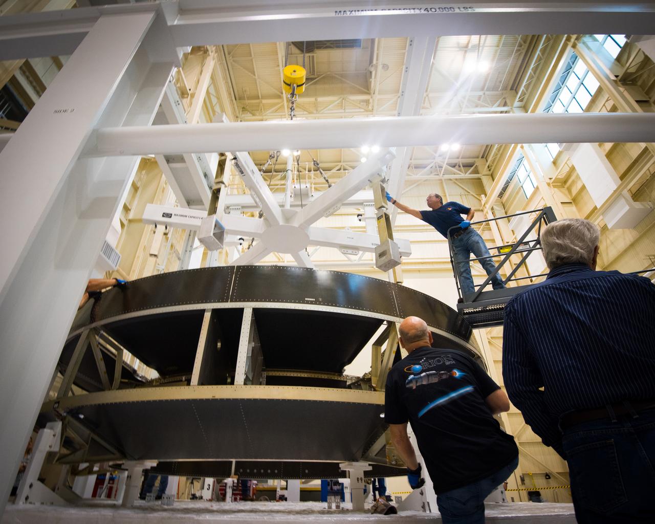 Engineers lift the Orion Crew Module Adapter Structural Test Article into the test stand at NASA Glenn Research Center Plum Brook Facility on Sept. 23, 2015.  Part of Batch image transfer from Flickr.
