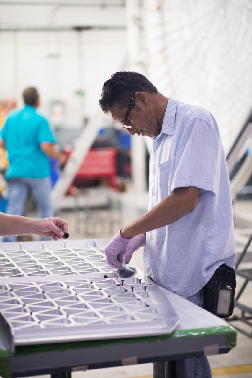 Lockheed Martin engineers at Michoud Assembly Facility in New Orleans, Louisiana, prepare elements of the Orion pressure vessel for welding on Sept. 23, 2015. Part of Batch image transfer from Flickr.