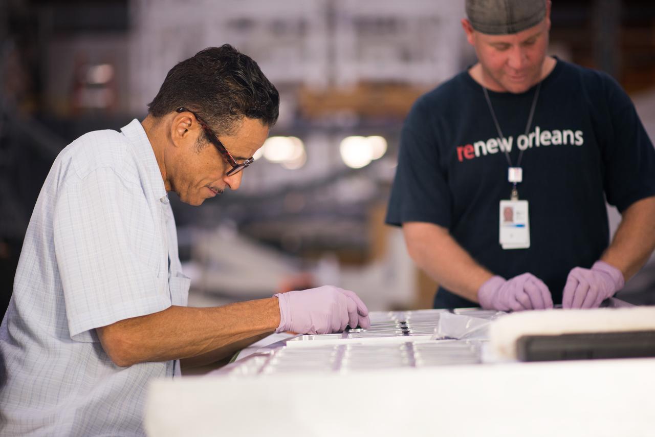 Lockheed Martin engineers at Michoud Assembly Facility in New Orleans, Louisiana, prepare elements of the Orion pressure vessel for welding on Sept. 23, 2015. Part of Batch image transfer from Flickr.
