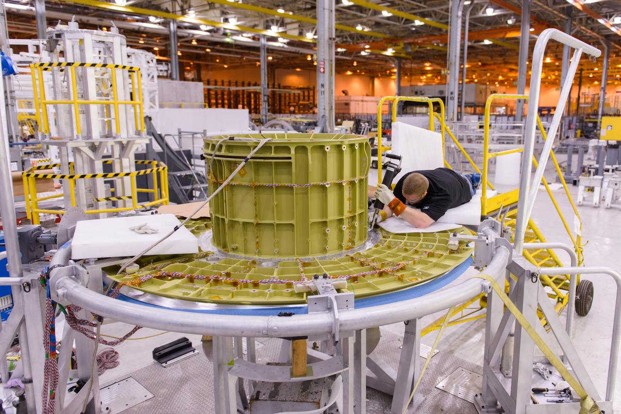 Lockheed Martin engineers at Michoud Assembly Facility in New Orleans, Louisiana, prepare elements of the Orion pressure vessel for welding on Sept. 23, 2015.  Part of Batch image transfer from Flickr.