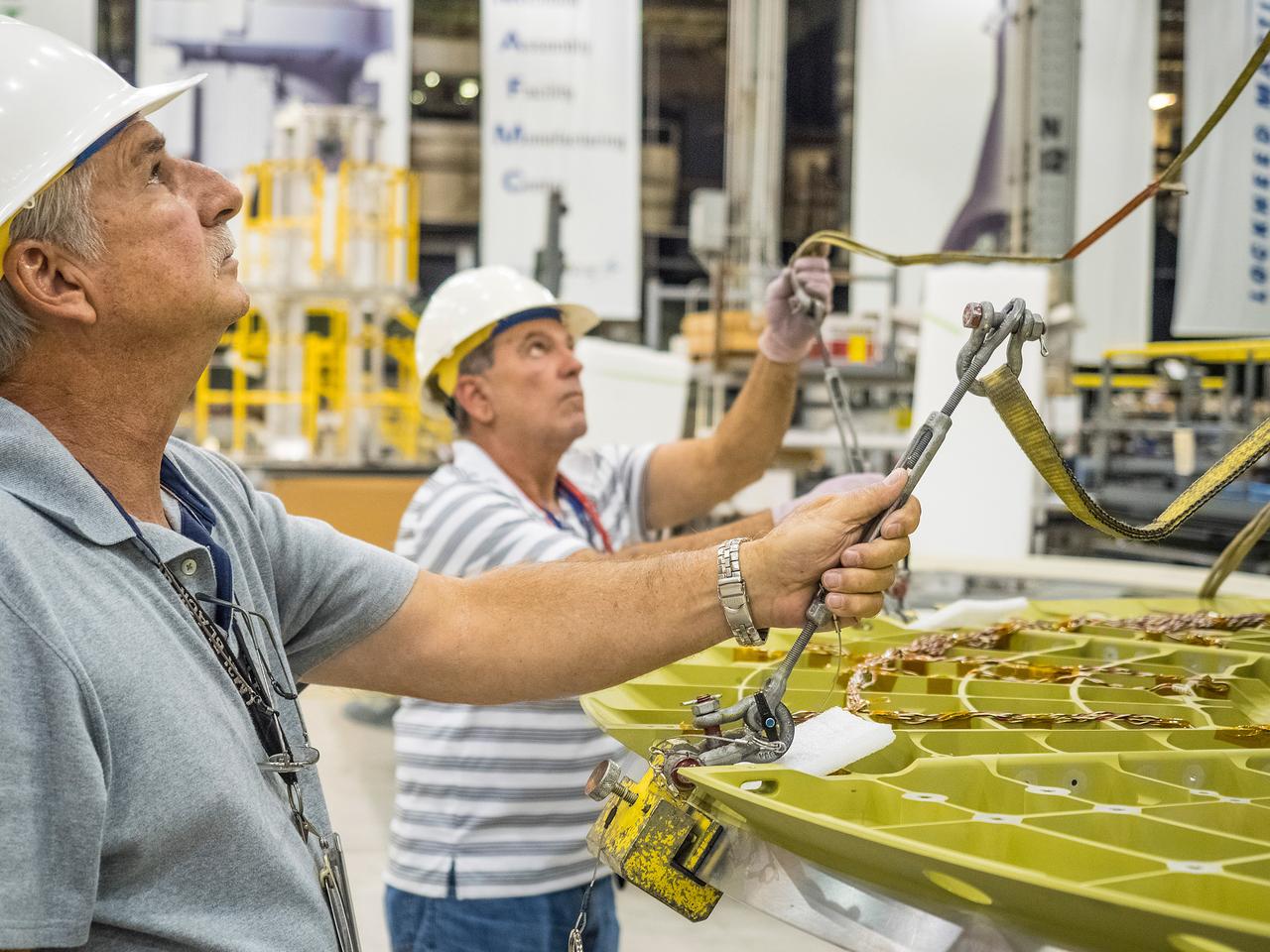 The first welded part of Artemis I Orion, the forward bulkhead and tunnel, is moved into final tooling at the Michoud Assembly Facility in New Orleans, Louisiana on Oct. 12, 2015. Part of Batch image transfer from Flickr.