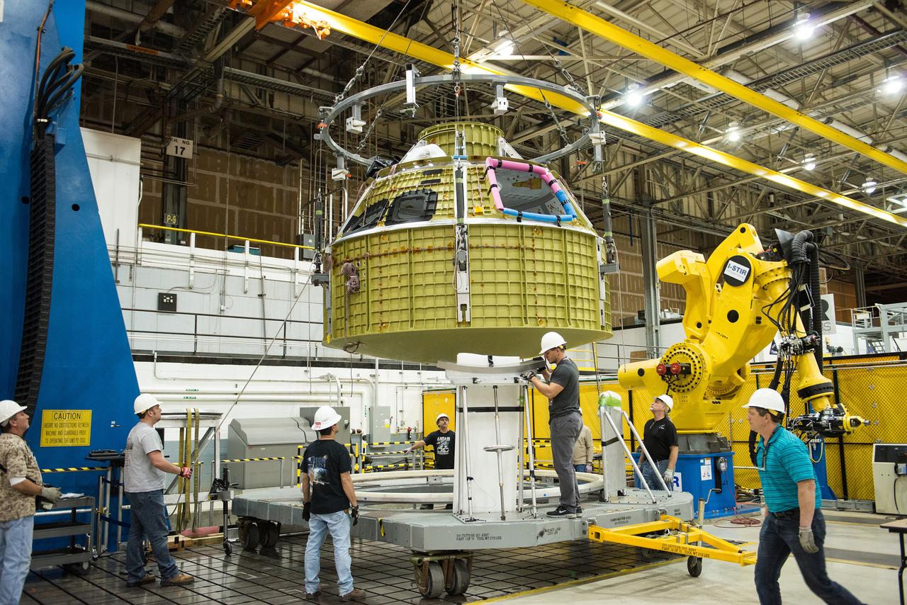 On Jan. 13, 2016, technicians at Michoud Assembly Facility in New Orleans finish welding together the primary structure of the Orion spacecraft destined for deep space on Artemis I.  Part of Batch image transfer from Flickr.