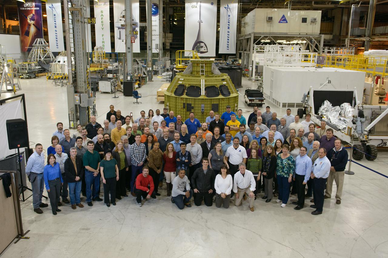The Orion team at the Michoud Assembly Facility in New Orleans poses with the Artemis I crew module pressure vessel on Jan. 27, 2016. Part of Batch image transfer from Flickr.