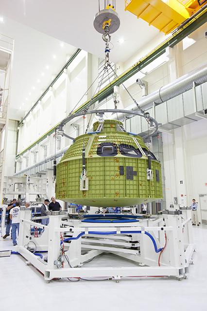 The Artemis I Orion pressure vessel sits fully unwrapped, lifted and moved to the birdcage inside the Operations and Checkout Building high bay at Kennedy Space Center on Feb. 2, 2016. Part of Batch image transfer from Flickr.