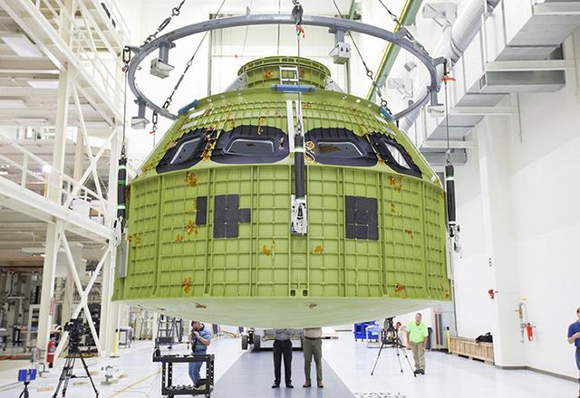 The Artemis I Orion pressure vessel sits fully unwrapped, lifted and moved to the birdcage inside the Operations and Checkout Building high bay at Kennedy Space Center on Feb. 2, 2016. Part of Batch image transfer from Flickr.
