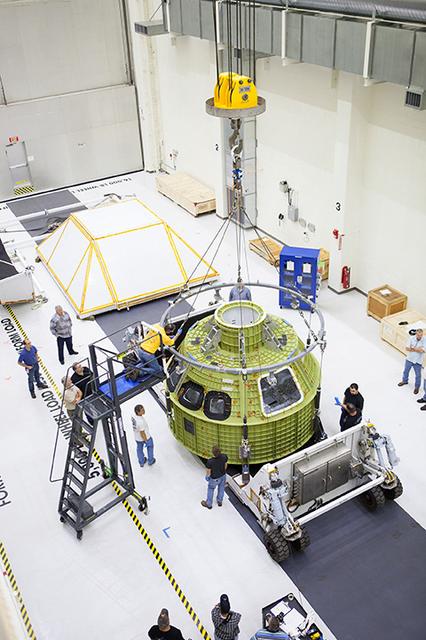 The Artemis I Orion pressure vessel sits fully unwrapped, lifted and moved to the birdcage inside the Operations and Checkout Building high bay at Kennedy Space Center on Feb. 2, 2016. Part of Batch image transfer from Flickr.