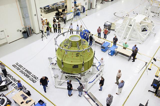The Artemis I Orion pressure vessel sits fully unwrapped, lifted and moved to the birdcage inside the Operations and Checkout Building high bay at Kennedy Space Center on Feb. 2, 2016. Part of Batch image transfer from Flickr.