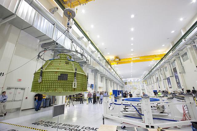 The Artemis I Orion pressure vessel sits fully unwrapped, lifted and moved to the birdcage inside the Operations and Checkout Building high bay at Kennedy Space Center on Feb. 2, 2016. Part of Batch image transfer from Flickr.