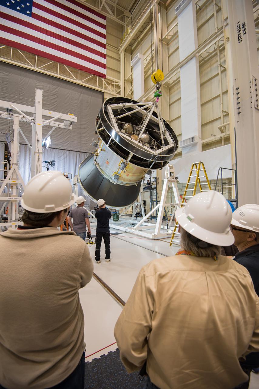 Engineers and technicians at NASA Glenn's Plum Brook Station in Sandusky, Ohio, are preparing for the first major test in the campaign to verify the structural integrity of Orion’s service module for Artemis I, the spacecraft’s first flight atop the agency’s Space Launch System (SLS) rocket. Orion’s service module, which will power and propel the vehicle and supply it with air and water, is being provided by ESA and built by Airbus Defence and Space. The solar array wing deployment test will verify that the qualification model wing unfurls as expected. On Saturday, Feb. 20, an international team of engineers and technicians lifted and tilted the service module test article -- which includes structural representations of the service module, crew module adapter, and spacecraft adapter -- to a 90 degree angle to position it for the deployment test of one of Orion’s four solar arrays. The next step in preparation for the test is attaching the solar array before the Feb. 29 deployment test. This is the first in a series of crucial tests to verify the service module’s structural integrity and ability to withstand the dynamic launch environment atop the SLS rocket.