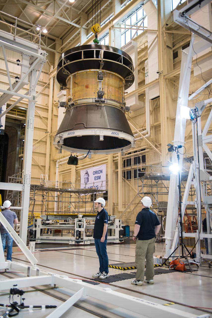 Engineers and technicians at NASA Glenn's Plum Brook Station in Sandusky, Ohio, are preparing for the first major test in the campaign to verify the structural integrity of Orion’s service module for Artemis I, the spacecraft’s first flight atop the agency’s Space Launch System (SLS) rocket. Orion’s service module, which will power and propel the vehicle and supply it with air and water, is being provided by ESA and built by Airbus Defence and Space. The solar array wing deployment test will verify that the qualification model wing unfurls as expected. On Saturday, Feb. 20, an international team of engineers and technicians lifted and tilted the service module test article -- which includes structural representations of the service module, crew module adapter, and spacecraft adapter -- to a 90 degree angle to position it for the deployment test of one of Orion’s four solar arrays. The next step in preparation for the test is attaching the solar array before the Feb. 29 deployment test. This is the first in a series of crucial tests to verify the service module’s structural integrity and ability to withstand the dynamic launch environment atop the SLS rocket.
