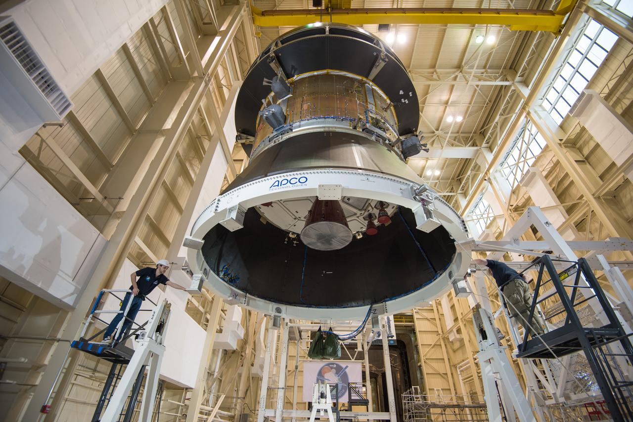 Engineers and technicians at NASA Glenn's Plum Brook Station in Sandusky, Ohio, are preparing for the first major test in the campaign to verify the structural integrity of Orion’s service module for Artemis I, the spacecraft’s first flight atop the agency’s Space Launch System (SLS) rocket. Orion’s service module, which will power and propel the vehicle and supply it with air and water, is being provided by ESA and built by Airbus Defence and Space. The solar array wing deployment test will verify that the qualification model wing unfurls as expected. On Saturday, Feb. 20, an international team of engineers and technicians lifted and tilted the service module test article -- which includes structural representations of the service module, crew module adapter, and spacecraft adapter -- to a 90 degree angle to position it for the deployment test of one of Orion’s four solar arrays. The next step in preparation for the test is attaching the solar array before the Feb. 29 deployment test. This is the first in a series of crucial tests to verify the service module’s structural integrity and ability to withstand the dynamic launch environment atop the SLS rocket.