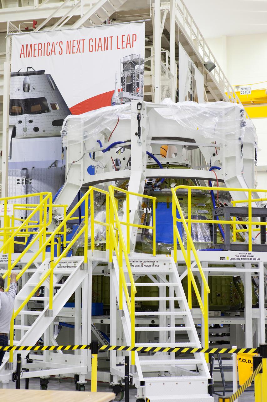 Engineers and technicians moved the Orion service module test article into the Reverberant Acoustic Test Facility at NASA Glenn Research Center’s Plum Brook Station in Sandusky, Ohio on April 8, 2016. Acoustic testing is scheduled to begin April 18. The blue structure sitting on top of the test article is a mass simulator that represents the Orion crew module...The test article will be blasted with at least 152 decibels and 20-10,000 hertz of sound pressure and vibration to simulate the intense sounds the Orion service module will be subjected to during launch and ascent into space atop the agency’s Space Launch System (SLS) rocket. This is part of a series of tests to verify the structural integrity of Orion’s service module for Exploration Mission-1, the spacecraft’s first flight atop SLS...Provided by ESA (European Space Agency) and built by Airbus Defence and Space, the service module will power, propel and cool the vehicle and also supply it with air and water.
