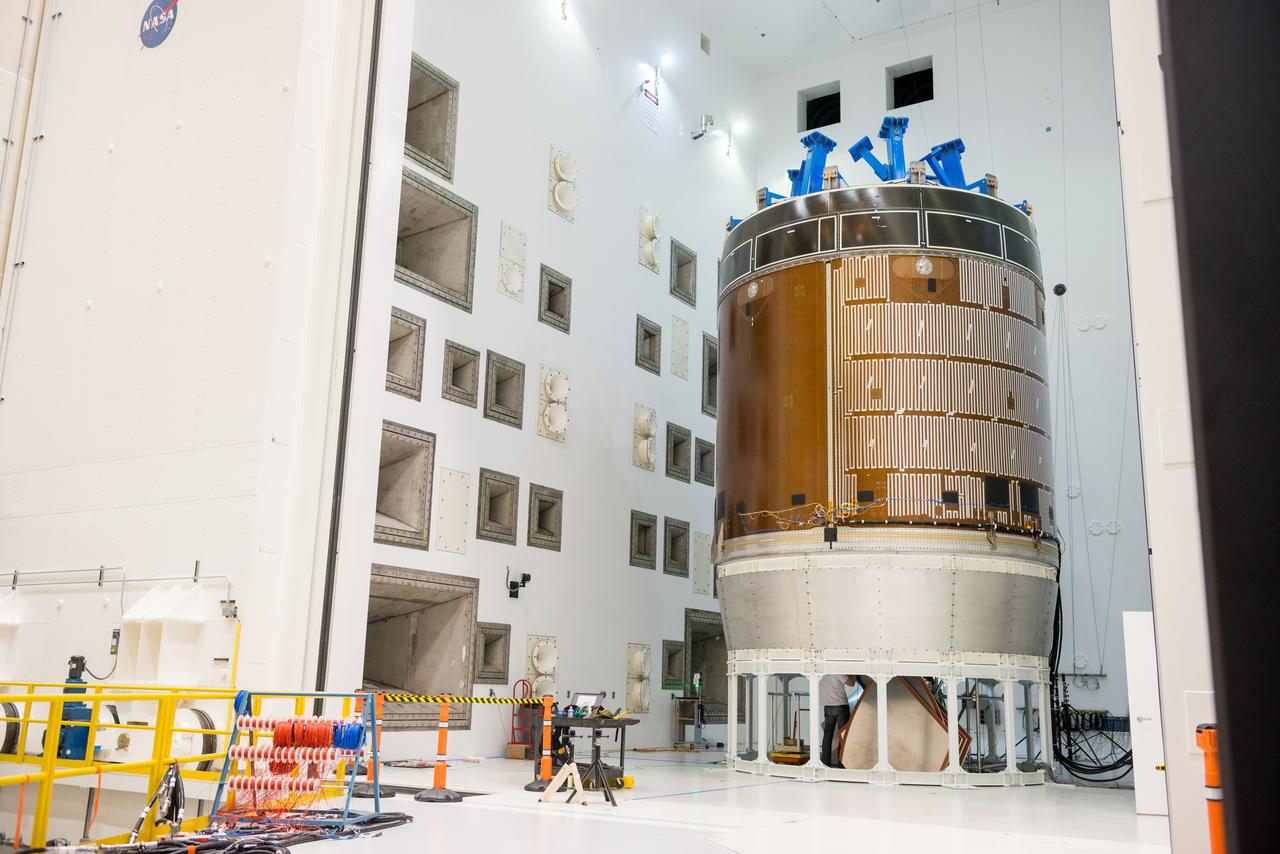 Engineers and technicians moved the Orion service module test article into the Reverberant Acoustic Test Facility at NASA Glenn Research Center’s Plum Brook Station in Sandusky, Ohio on April 8, 2016. Acoustic testing is scheduled to begin April 18. The blue structure sitting on top of the test article is a mass simulator that represents the Orion crew module...The test article will be blasted with at least 152 decibels and 20-10,000 hertz of sound pressure and vibration to simulate the intense sounds the Orion service module will be subjected to during launch and ascent into space atop the agency’s Space Launch System (SLS) rocket. This is part of a series of tests to verify the structural integrity of Orion’s service module for Exploration Mission-1, the spacecraft’s first flight atop SLS...Provided by ESA (European Space Agency) and built by Airbus Defence and Space, the service module will power, propel and cool the vehicle and also supply it with air and water.