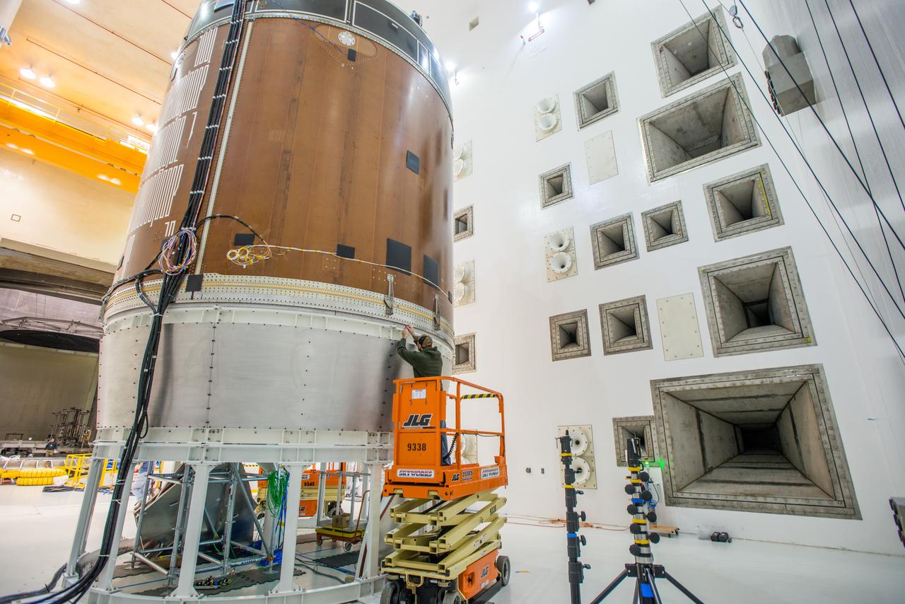 Engineers and technicians moved the Orion service module test article into the Reverberant Acoustic Test Facility at NASA Glenn Research Center’s Plum Brook Station in Sandusky, Ohio on April 8, 2016. Acoustic testing is scheduled to begin April 18. The blue structure sitting on top of the test article is a mass simulator that represents the Orion crew module...The test article will be blasted with at least 152 decibels and 20-10,000 hertz of sound pressure and vibration to simulate the intense sounds the Orion service module will be subjected to during launch and ascent into space atop the agency’s Space Launch System (SLS) rocket. This is part of a series of tests to verify the structural integrity of Orion’s service module for Exploration Mission-1, the spacecraft’s first flight atop SLS...Provided by ESA (European Space Agency) and built by Airbus Defence and Space, the service module will power, propel and cool the vehicle and also supply it with air and water.