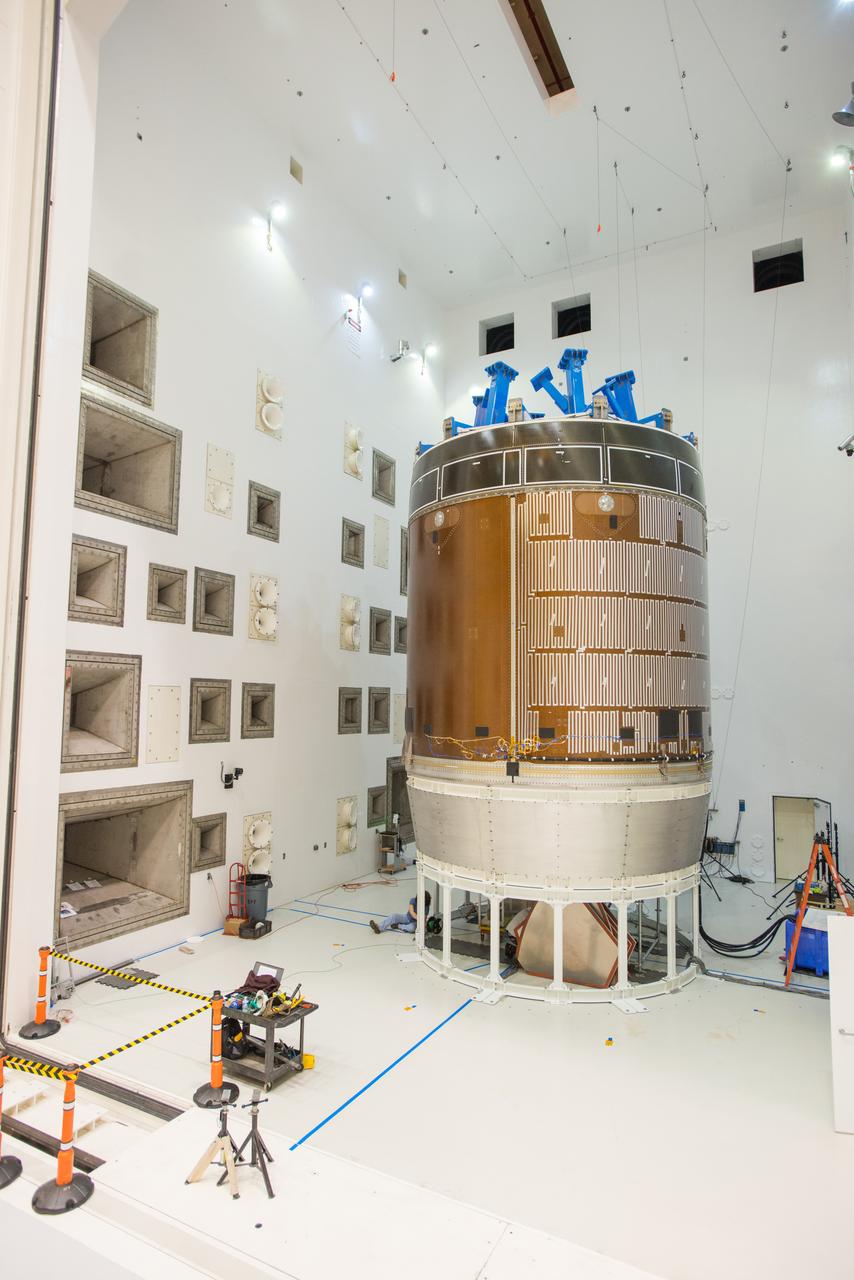 Engineers and technicians moved the Orion service module test article into the Reverberant Acoustic Test Facility at NASA Glenn Research Center’s Plum Brook Station in Sandusky, Ohio on April 8, 2016. Acoustic testing is scheduled to begin April 18. The blue structure sitting on top of the test article is a mass simulator that represents the Orion crew module...The test article will be blasted with at least 152 decibels and 20-10,000 hertz of sound pressure and vibration to simulate the intense sounds the Orion service module will be subjected to during launch and ascent into space atop the agency’s Space Launch System (SLS) rocket. This is part of a series of tests to verify the structural integrity of Orion’s service module for Exploration Mission-1, the spacecraft’s first flight atop SLS...Provided by ESA (European Space Agency) and built by Airbus Defence and Space, the service module will power, propel and cool the vehicle and also supply it with air and water.