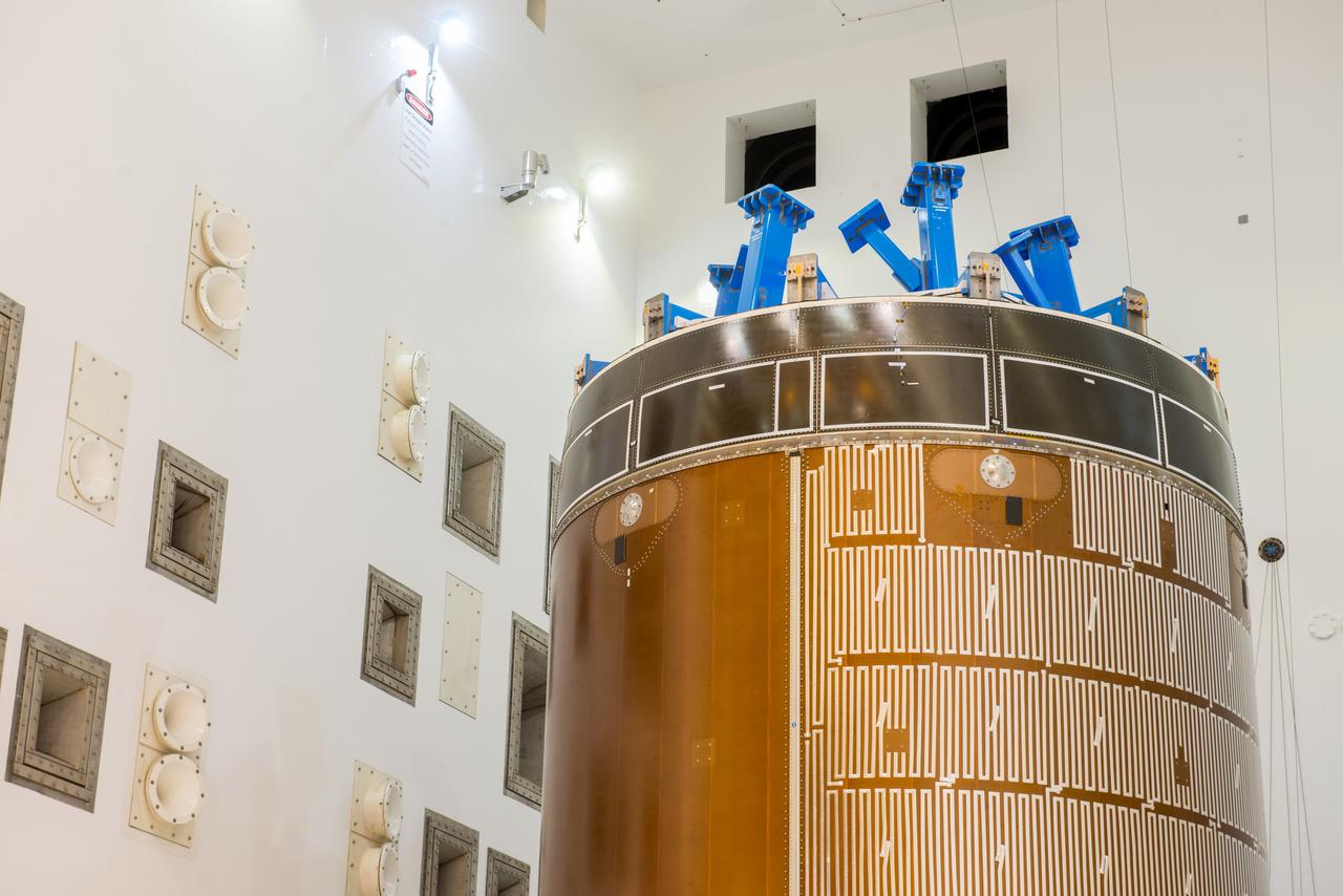 Engineers and technicians moved the Orion service module test article into the Reverberant Acoustic Test Facility at NASA Glenn Research Center’s Plum Brook Station in Sandusky, Ohio on April 8, 2016. Acoustic testing is scheduled to begin April 18. The blue structure sitting on top of the test article is a mass simulator that represents the Orion crew module...The test article will be blasted with at least 152 decibels and 20-10,000 hertz of sound pressure and vibration to simulate the intense sounds the Orion service module will be subjected to during launch and ascent into space atop the agency’s Space Launch System (SLS) rocket. This is part of a series of tests to verify the structural integrity of Orion’s service module for Exploration Mission-1, the spacecraft’s first flight atop SLS...Provided by ESA (European Space Agency) and built by Airbus Defence and Space, the service module will power, propel and cool the vehicle and also supply it with air and water.