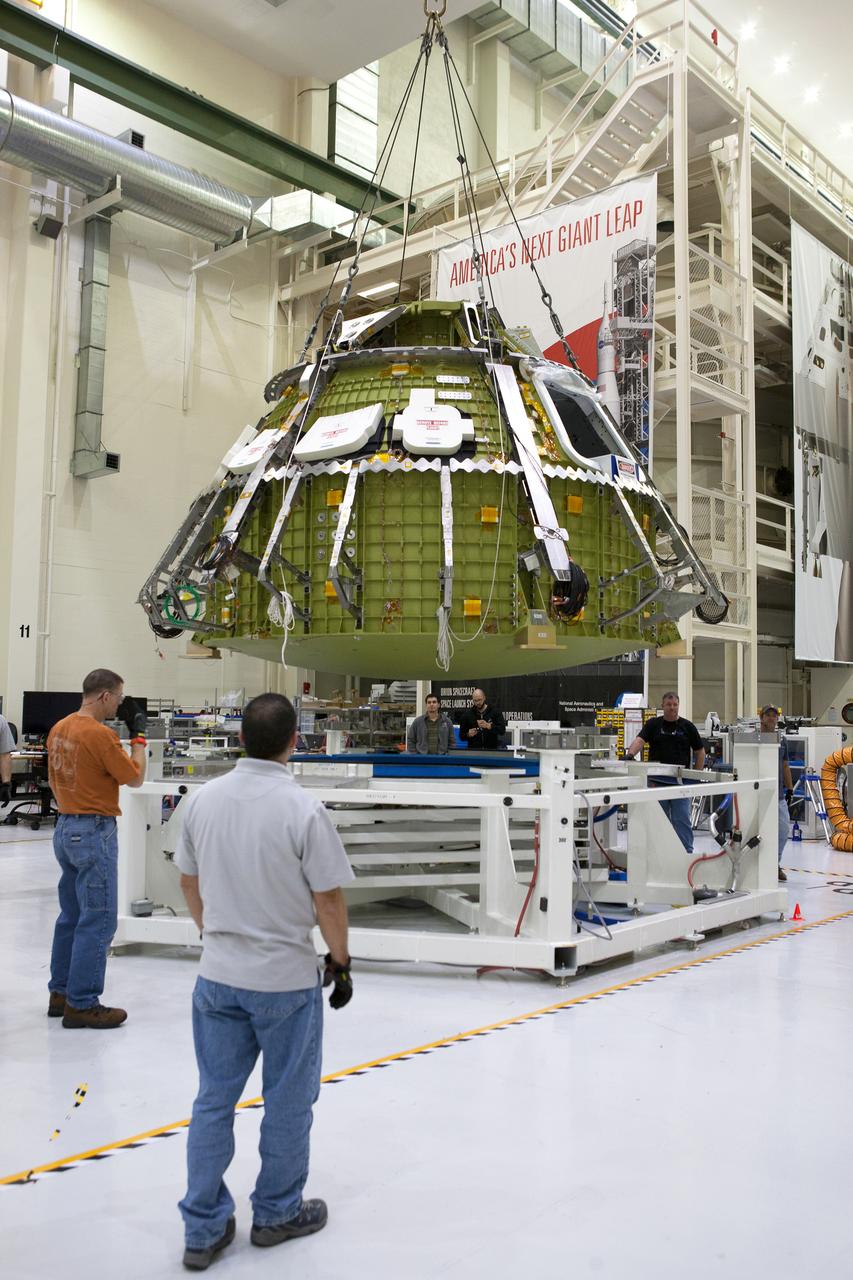 The Orion crew module for Artemis I is lifted into a test stand for pressure testing in the Neil Armstrong Operations and Checkout Building at NASA's Kennedy Space Center in Florida on April 21, 2016.