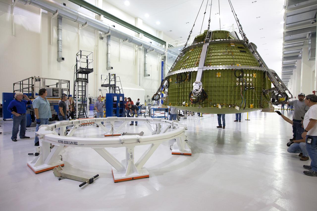The Orion crew module for Artemis I is lifted into a test stand for pressure testing in the Neil Armstrong Operations and Checkout Building at NASA's Kennedy Space Center in Florida on April 21, 2016.