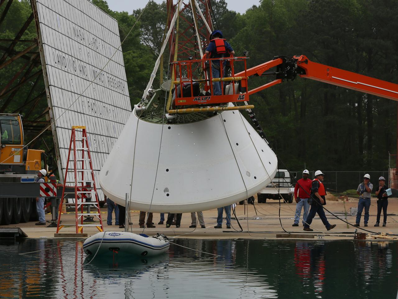 An Orion water drop test, with instrumented test dummies, takes place on May 11, 2016 at NASA's Langley Research Center in Virginia.