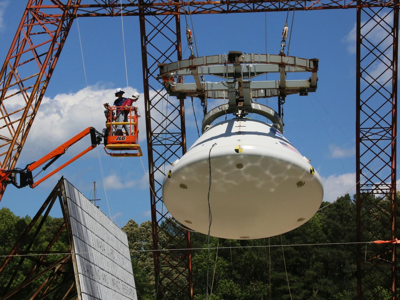 The Orion Ground Test Article completes its first swing water impact test at NASA's Langley Research Center in Virginia on June 8, 2016.