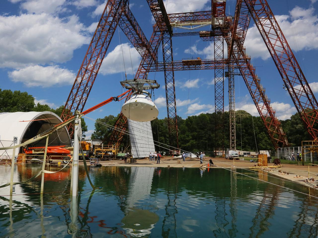 The Orion Ground Test Article completes its first swing water impact test at NASA's Langley Research Center in Virginia on June 8, 2016.