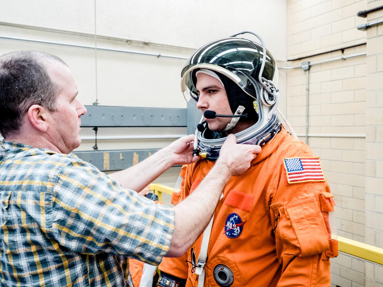 In a lab at NASA’s Johnson Space Center in Houston, engineers simulate conditions that astronauts in space suits would experience when the Orion spacecraft is vibrating during launch atop the agency’s powerful Space Launch System rocket on its way to deep space destinations on Jan. 19, 2017. A series of tests occurring this month at Johnson will help human factors engineers assess how well the crew can interact with the displays and controls they will use to monitor Orion’s systems and operate the spacecraft when necessary...Test subjects wore modified advanced crew escape suits that are being developed for astronauts in Orion, and sat in the latest design of the seat atop the crew impact attenuation system. This was the first time this key hardware was brought together to evaluate how launch vibrations may impact the astronaut’s ability to view the displays and controls.