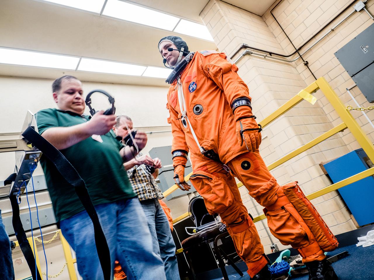 In a lab at NASA’s Johnson Space Center in Houston, engineers simulate conditions that astronauts in space suits would experience when the Orion spacecraft is vibrating during launch atop the agency’s powerful Space Launch System rocket on its way to deep space destinations on Jan. 19, 2017. A series of tests occurring this month at Johnson will help human factors engineers assess how well the crew can interact with the displays and controls they will use to monitor Orion’s systems and operate the spacecraft when necessary...Test subjects wore modified advanced crew escape suits that are being developed for astronauts in Orion, and sat in the latest design of the seat atop the crew impact attenuation system. This was the first time this key hardware was brought together to evaluate how launch vibrations may impact the astronaut’s ability to view the displays and controls.