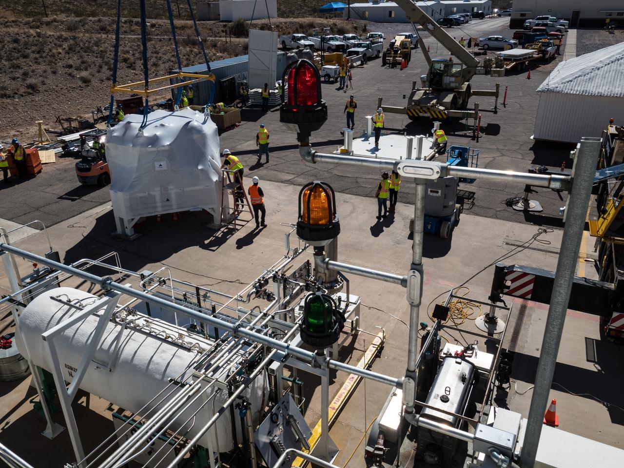 On Feb. 21, 2017 engineers successfully install ESA’s European Service Module Propulsion Qualification Module (PQM) at NASA’s White Sands Test Facility in New Mexico that was delivered by Airbus – ESA’s prime contractor for the Service Module. The module will be equipped with a total of 21 engines to support NASA’s Orion spacecraft: one U.S. Space Shuttle Orbital Maneuvering System (OMS) engine, eight auxiliary thrusters and 12 smaller thrusters produced by Airbus Safran Launchers in Germany. The all-steel PQM structure is used to test the propulsion systems on Orion, including “hot firing” of the OMS engine and thrusters.