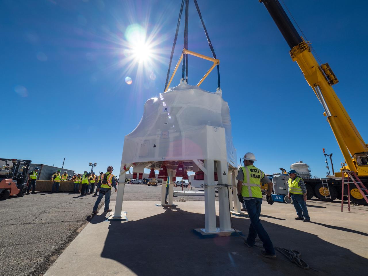 On Feb. 21, 2017 engineers successfully install ESA’s European Service Module Propulsion Qualification Module (PQM) at NASA’s White Sands Test Facility in New Mexico that was delivered by Airbus – ESA’s prime contractor for the Service Module. The module will be equipped with a total of 21 engines to support NASA’s Orion spacecraft: one U.S. Space Shuttle Orbital Maneuvering System (OMS) engine, eight auxiliary thrusters and 12 smaller thrusters produced by Airbus Safran Launchers in Germany. The all-steel PQM structure is used to test the propulsion systems on Orion, including “hot firing” of the OMS engine and thrusters.