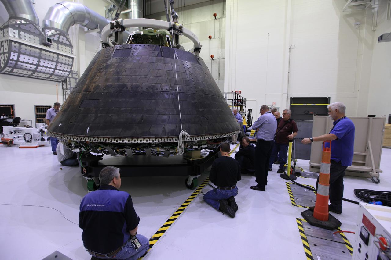 The Exploration Flight Test-1 (EFT-1) Crew Module undergoes preparations to move from the Operations and Checkout Building at Kennedy Space Center to the KSC Visitor Complex on April 6, 2017.