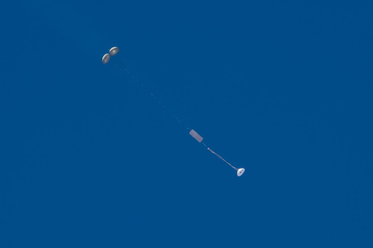A drop test at U.S. Army Yuma Proving Ground in Yuma, Arizona qualifying Orion's parachute system for human spaceflight takes place on June 14, 2017. Part of Batch images transfer from Flickr.