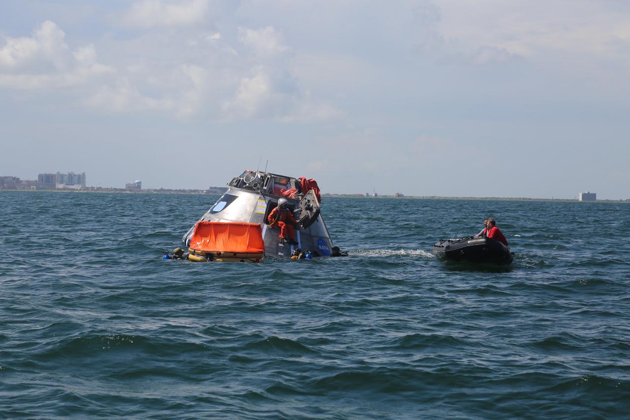 When astronauts return to Earth from destinations beyond the Moon in NASA’s Orion spacecraft and splashdown in the Pacific Ocean, they’ll still need to safely get out of the spacecraft and back on dry land. Using the waters off the coast of Galveston, Texas, a NASA and Department of Defense team test Orion exit procedures in a variety of scenarios on July 11, 2017. Part of Batch images transfer from Flickr.