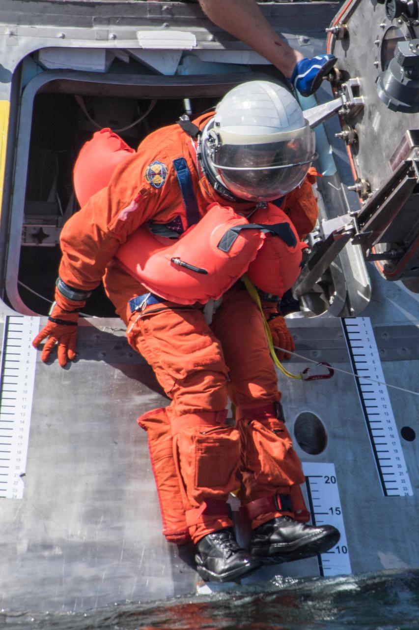 When astronauts return to Earth from destinations beyond the Moon in NASA’s Orion spacecraft and splashdown in the Pacific Ocean, they’ll still need to safely get out of the spacecraft and back on dry land. Using the waters off the coast of Galveston, Texas, a NASA and Department of Defense team test Orion exit procedures in a variety of scenarios on July 11, 2017. Part of Batch images transfer from Flickr.