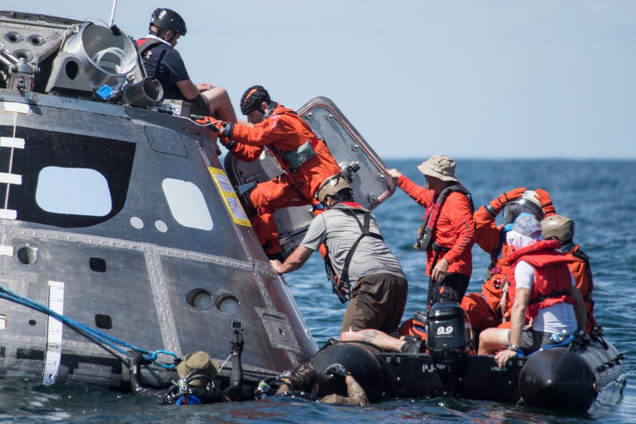 When astronauts return to Earth from destinations beyond the Moon in NASA’s Orion spacecraft and splashdown in the Pacific Ocean, they’ll still need to safely get out of the spacecraft and back on dry land. Using the waters off the coast of Galveston, Texas, a NASA and Department of Defense team test Orion exit procedures in a variety of scenarios on July 11, 2017. Part of Batch images transfer from Flickr.