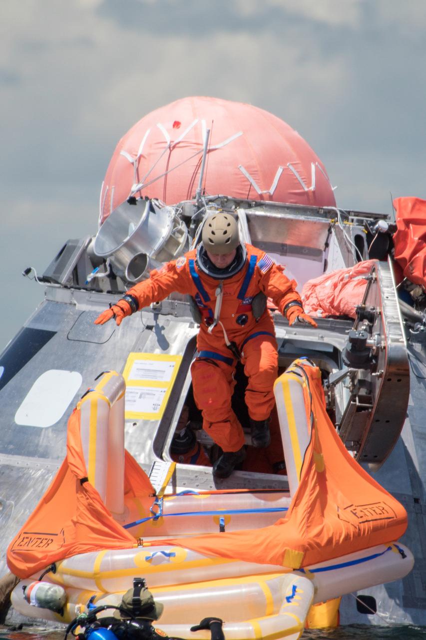 When astronauts return to Earth from destinations beyond the Moon in NASA’s Orion spacecraft and splashdown in the Pacific Ocean, they’ll still need to safely get out of the spacecraft and back on dry land. Using the waters off the coast of Galveston, Texas, a NASA and Department of Defense team test Orion exit procedures in a variety of scenarios on July 11, 2017. Part of Batch images transfer from Flickr.