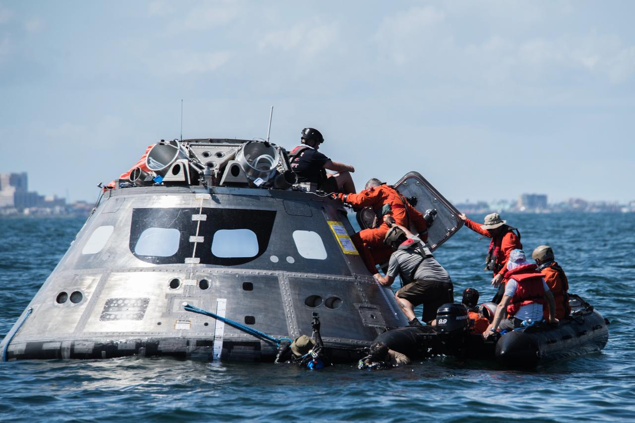 When astronauts return to Earth from destinations beyond the Moon in NASA’s Orion spacecraft and splashdown in the Pacific Ocean, they’ll still need to safely get out of the spacecraft and back on dry land. Using the waters off the coast of Galveston, Texas, a NASA and Department of Defense team test Orion exit procedures in a variety of scenarios on July 11, 2017. Part of Batch images transfer from Flickr.