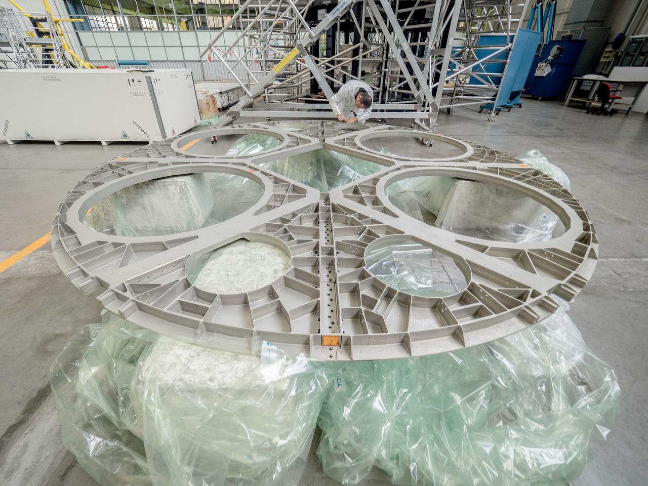 While engineers in Europe continue to outfit the Orion spacecraft’s service module for Artemis I in preparation for shipment to NASA’s Kennedy Space Center in Florida next year, work is already beginning on the service module that will power, propel, cool and provide air and water for the first crewed mission in the Orion spacecraft in the early 2020s. On Sept. 19, 2017, technicians at Thales Alenia in Turin, Italy, work on the primary structure of the European Service Module that will carry astronauts in Orion beyond the Moon during Artemis II. ESA (European Space Agency) and its contractors are providing Orion’s service module for its first two missions atop the Space Launch System rocket. NASA is leading the next steps in human space exploration and will send astronauts to the vicinity of the Moon to build and test the systems needed for challenging missions to deep space destinations including Mars. NASA is working with domestic and international partners to solve the great challenges of deep space exploration.