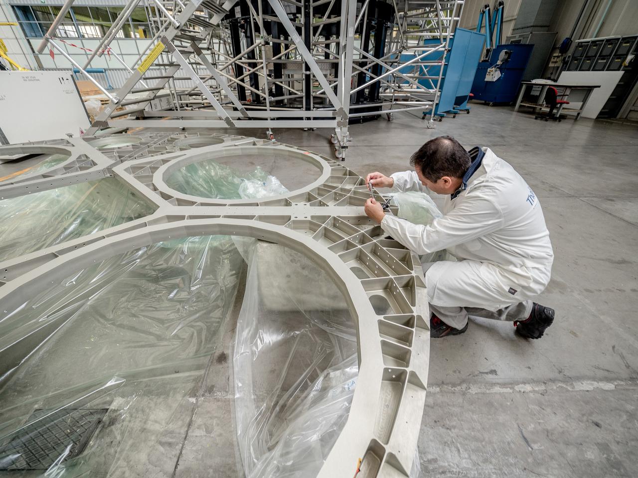 While engineers in Europe continue to outfit the Orion spacecraft’s service module for Artemis I in preparation for shipment to NASA’s Kennedy Space Center in Florida next year, work is already beginning on the service module that will power, propel, cool and provide air and water for the first crewed mission in the Orion spacecraft in the early 2020s. On Sept. 19, 2017, technicians at Thales Alenia in Turin, Italy, work on the primary structure of the European Service Module that will carry astronauts in Orion beyond the Moon during Artemis II. ESA (European Space Agency) and its contractors are providing Orion’s service module for its first two missions atop the Space Launch System rocket. NASA is leading the next steps in human space exploration and will send astronauts to the vicinity of the Moon to build and test the systems needed for challenging missions to deep space destinations including Mars. NASA is working with domestic and international partners to solve the great challenges of deep space exploration.