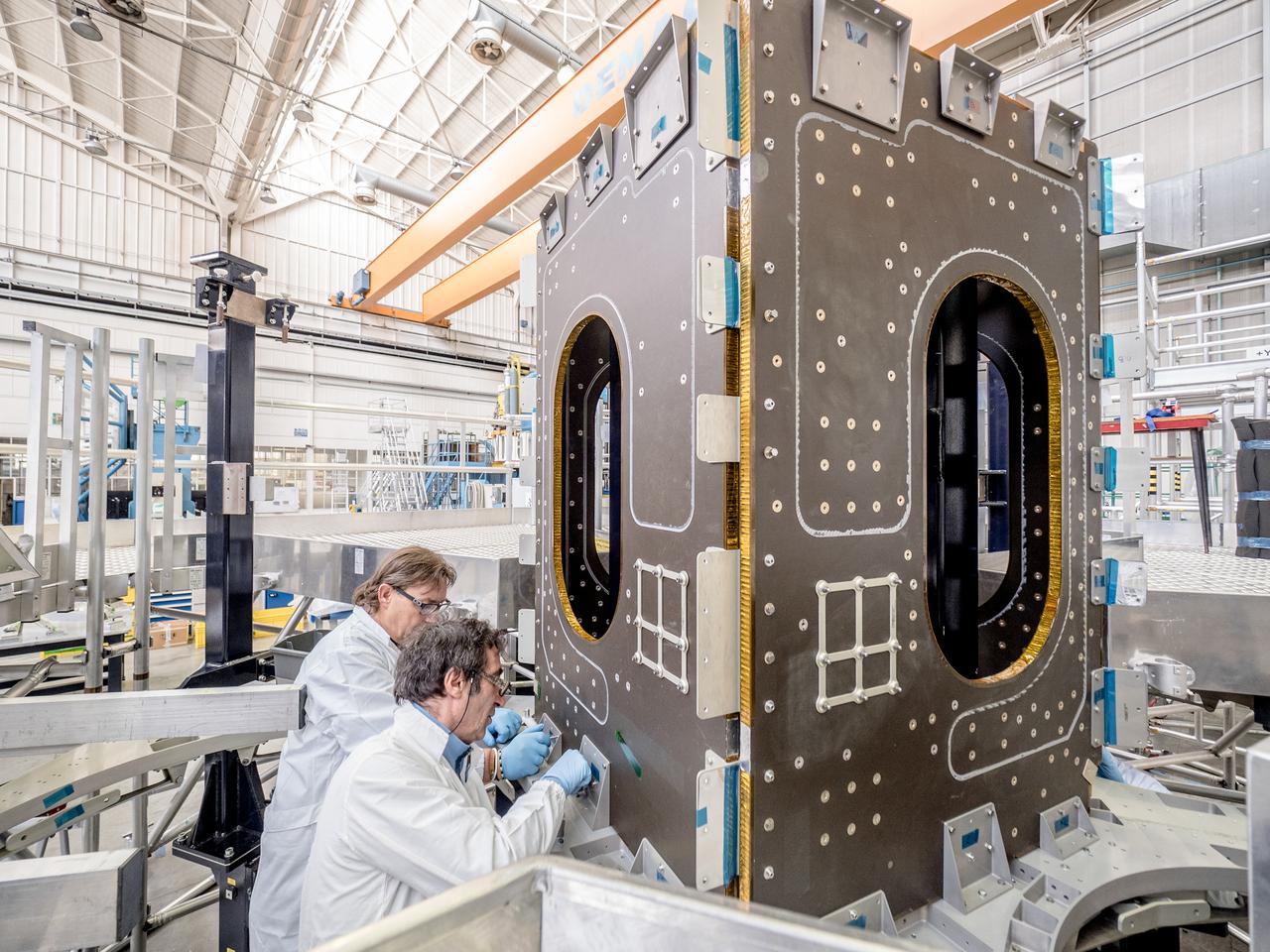 While engineers in Europe continue to outfit the Orion spacecraft’s service module for Artemis I in preparation for shipment to NASA’s Kennedy Space Center in Florida next year, work is already beginning on the service module that will power, propel, cool and provide air and water for the first crewed mission in the Orion spacecraft in the early 2020s. On Sept. 19, 2017, technicians at Thales Alenia in Turin, Italy, work on the primary structure of the European Service Module that will carry astronauts in Orion beyond the Moon during Artemis II. ESA (European Space Agency) and its contractors are providing Orion’s service module for its first two missions atop the Space Launch System rocket. NASA is leading the next steps in human space exploration and will send astronauts to the vicinity of the Moon to build and test the systems needed for challenging missions to deep space destinations including Mars. NASA is working with domestic and international partners to solve the great challenges of deep space exploration.