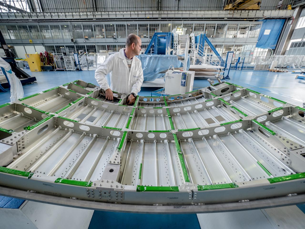 While engineers in Europe continue to outfit the Orion spacecraft’s service module for Artemis I in preparation for shipment to NASA’s Kennedy Space Center in Florida next year, work is already beginning on the service module that will power, propel, cool and provide air and water for the first crewed mission in the Orion spacecraft in the early 2020s. On Sept. 19, 2017, technicians at Thales Alenia in Turin, Italy, work on the primary structure of the European Service Module that will carry astronauts in Orion beyond the Moon during Artemis II. ESA (European Space Agency) and its contractors are providing Orion’s service module for its first two missions atop the Space Launch System rocket. NASA is leading the next steps in human space exploration and will send astronauts to the vicinity of the Moon to build and test the systems needed for challenging missions to deep space destinations including Mars. NASA is working with domestic and international partners to solve the great challenges of deep space exploration.