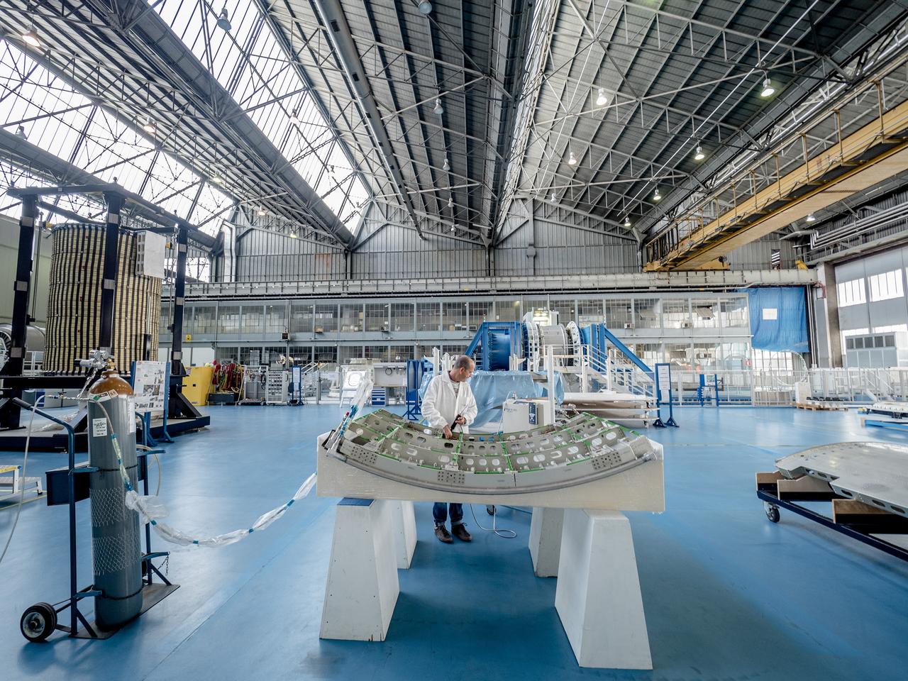 While engineers in Europe continue to outfit the Orion spacecraft’s service module for Artemis I in preparation for shipment to NASA’s Kennedy Space Center in Florida next year, work is already beginning on the service module that will power, propel, cool and provide air and water for the first crewed mission in the Orion spacecraft in the early 2020s. On Sept. 19, 2017, technicians at Thales Alenia in Turin, Italy, work on the primary structure of the European Service Module that will carry astronauts in Orion beyond the Moon during Artemis II. ESA (European Space Agency) and its contractors are providing Orion’s service module for its first two missions atop the Space Launch System rocket. NASA is leading the next steps in human space exploration and will send astronauts to the vicinity of the Moon to build and test the systems needed for challenging missions to deep space destinations including Mars. NASA is working with domestic and international partners to solve the great challenges of deep space exploration.