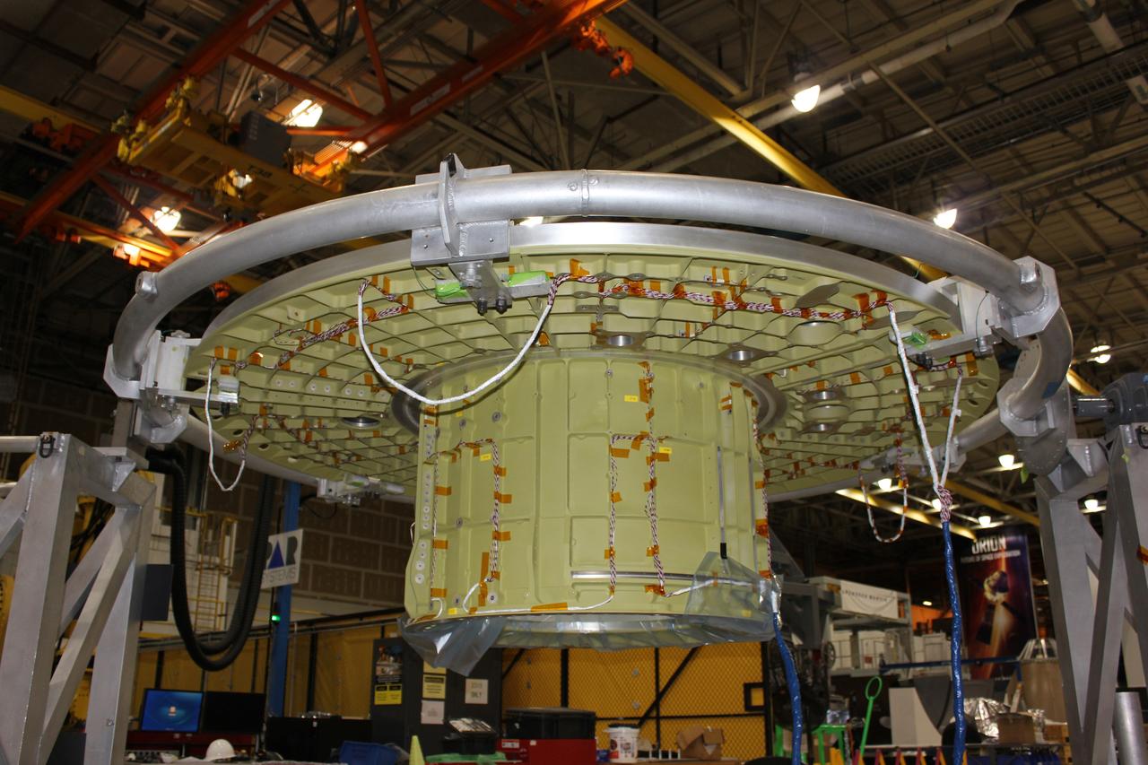 At NASA's Michoud Assembly Facility in Louisiana, Lockheed Martin technicians complete the first weld on the pressure vessel for Orion which will carry humans to deep space on Artemis II on Dec. 21, 2017.