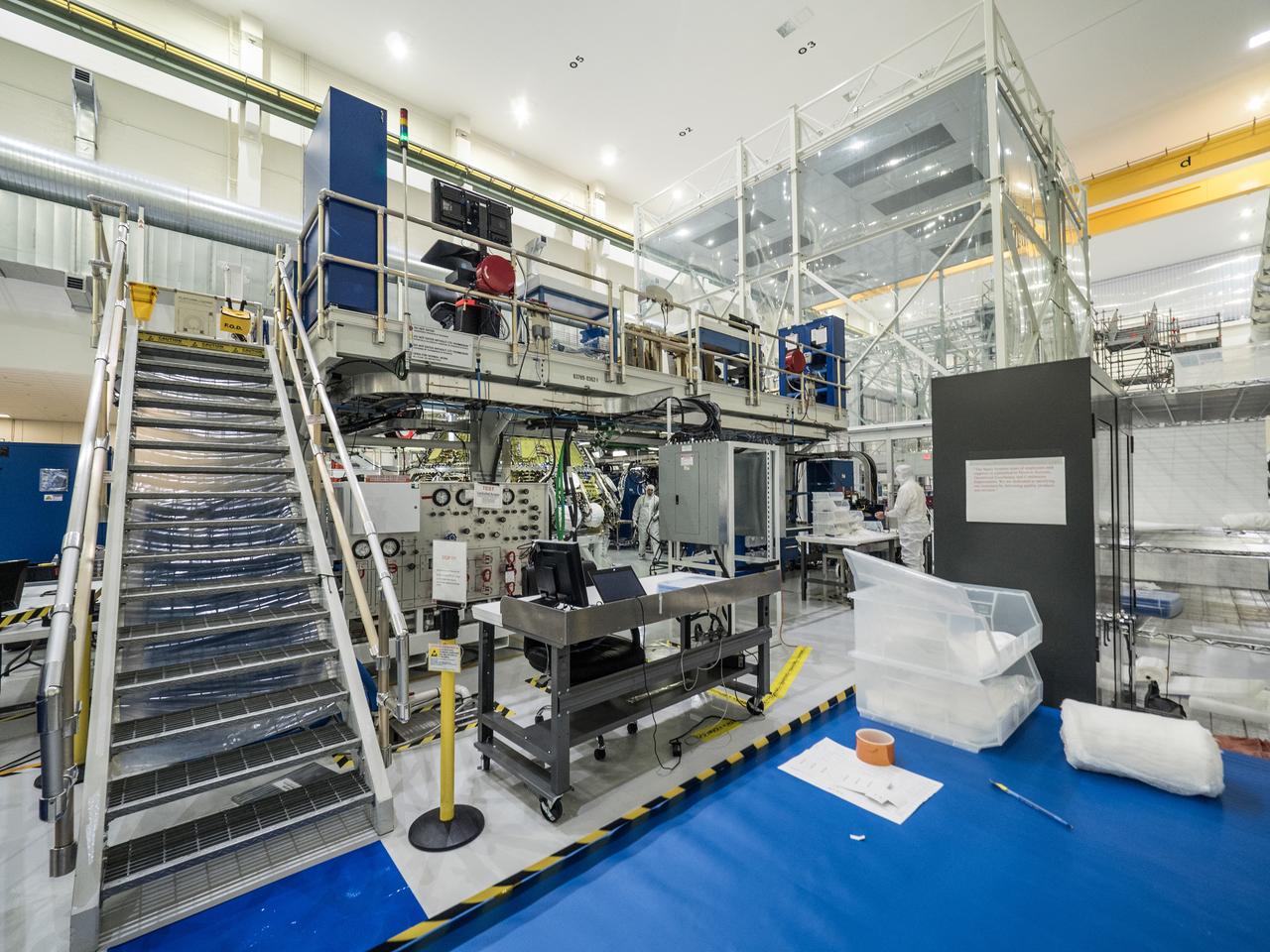 Lockheed Martin engineers assemble Orion's Artemis I crew module at NASA's Kennedy Space Center Operations and Checkout Building on April 27, 2018.