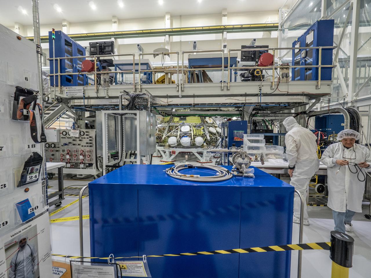 Lockheed Martin engineers assemble Orion's Artemis I crew module at NASA's Kennedy Space Center Operations and Checkout Building on April 27, 2018.
