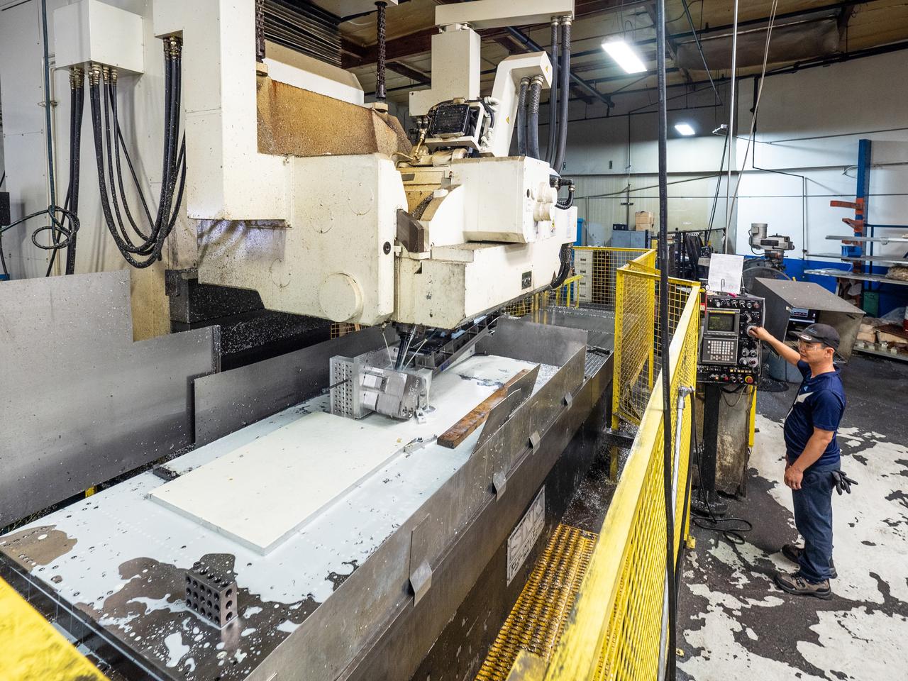 Parts for the Orion crew module which will carry astronauts on Artemis II are machined at Aerospace Engineering Corporation in California on June 18, 2018.